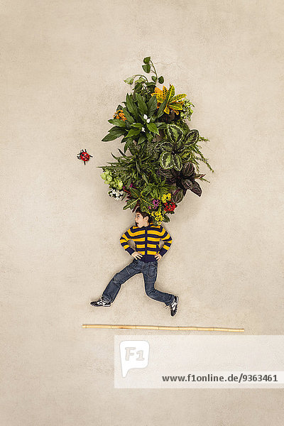 Boy with plants growing from his head