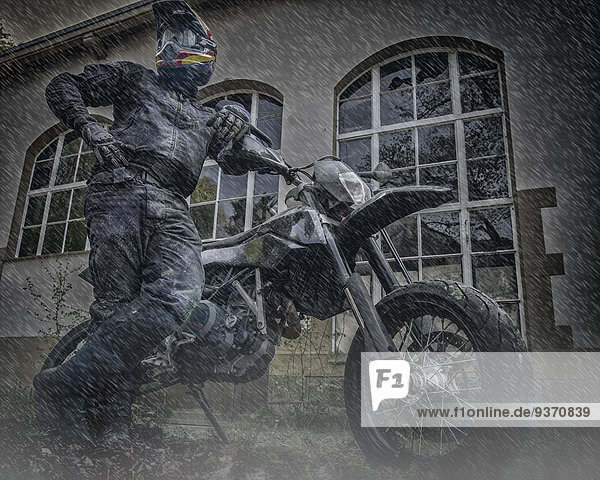 Motorcyclist in rain