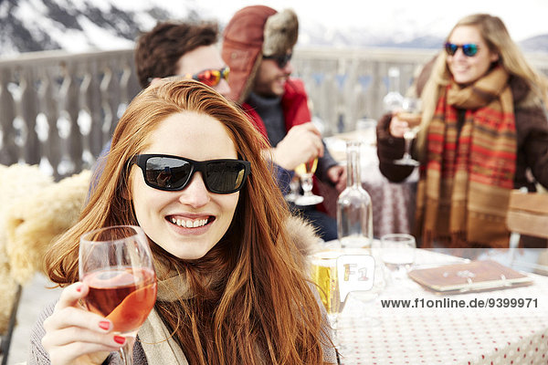 Woman enjoying drinks with friends