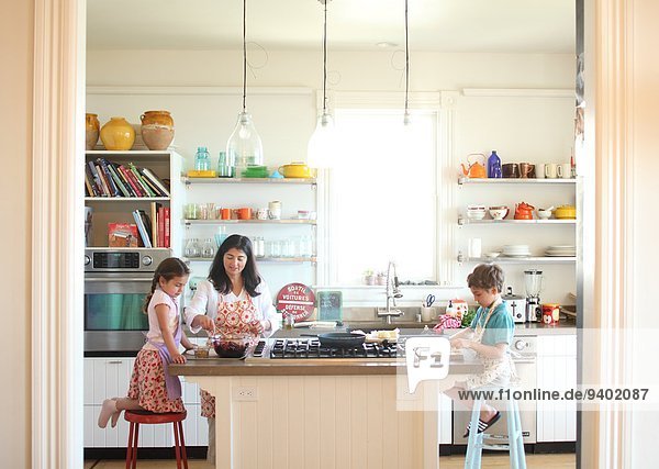 Mother cooking with kids