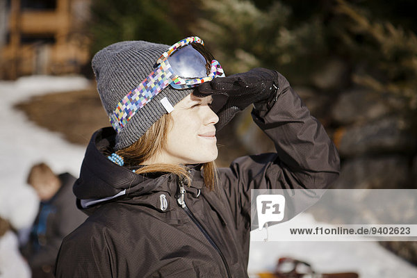 A female snowboarder.