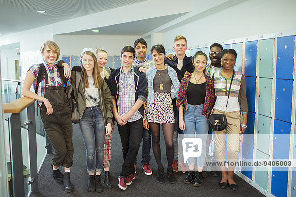 Group of students posing in corridor