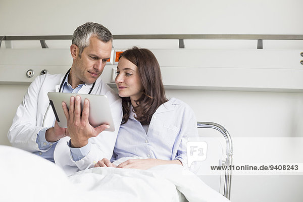 Doctor discussing treatment with patient