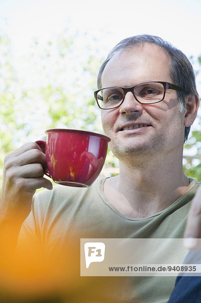 Portrait Mann Tasse lächeln reifer Erwachsene reife Erwachsene Kaffee