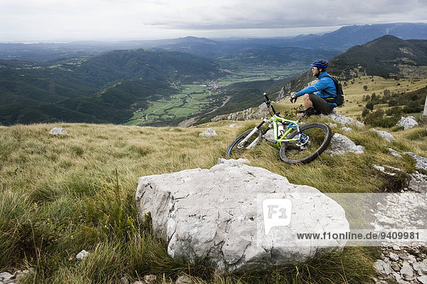 mountain biker having a rest  Vipava valley  Istria  Nanos  Slovenia