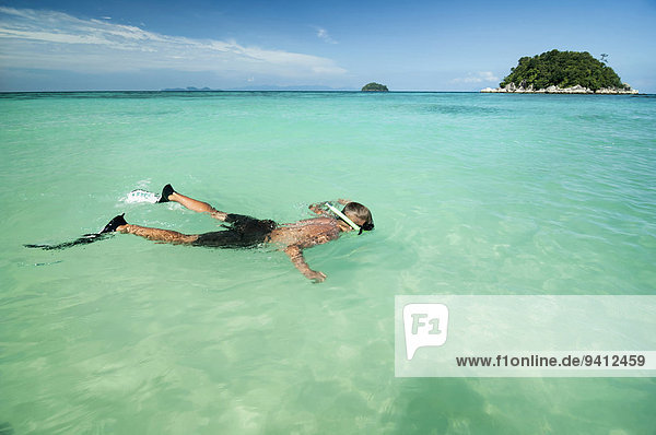 teenage boy snorkeling  Koh Lipe  Thailand