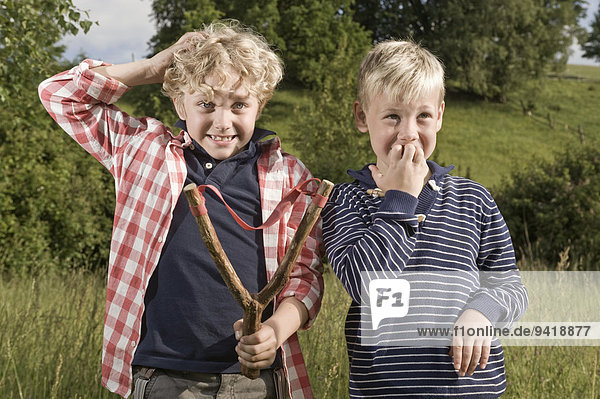 Young boys slingshot problem accident trouble