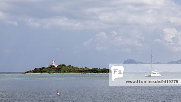 Lighthouse on the island Alcanada  off Alcudia  Majorca  Balearic Islands  Spain