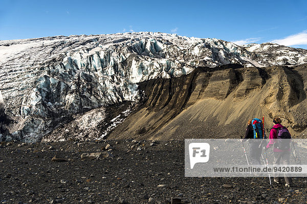 Ice formations hike through snow-capped volcanic mountain chain Kverkfjöll on the northern edge of the Vatnajökull glacier highlands Iceland