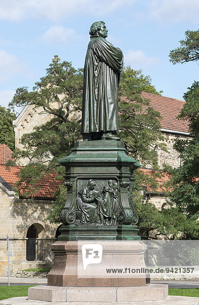 Luther Memorial  west side  relief of the young Luther  bronze  1895  sculptor Adolf von Donndorf  renovated state in 2014  Eisenach  Thuringia  Germany