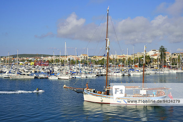 Old sailing boat as excursion boat in the harbour  Alghero  Province of Sassari  Sardinia  Italy