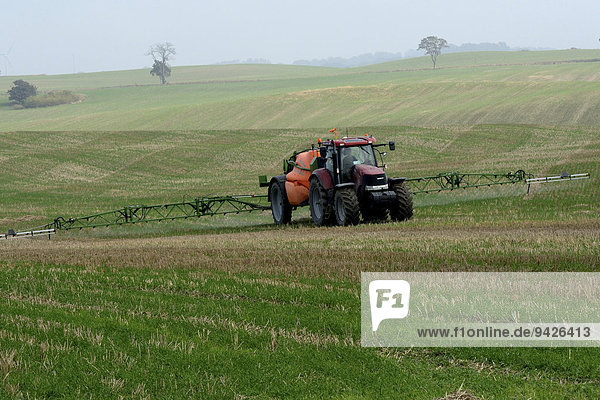 Crop-spraying on farming field  Ystad  Scania  Sweden