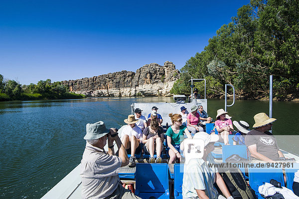 Tourists on a tourist boat in the Geikie Gorge Kimberley Western Australia