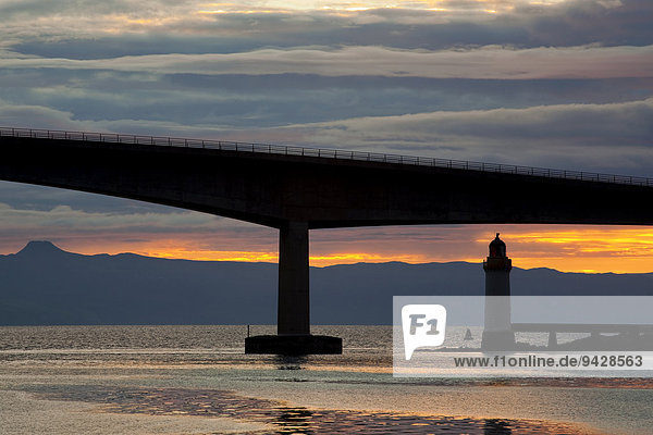 The Sky Bridge and lighthouse in the last evening light in Kyleakin  Isle of Skye  Highland Council  Scotland  United Kingdom  Europe