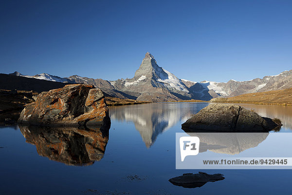 Morning mood with the Matterhorn reflected in Lake Stellisee  Zermatt  Valais  Swiss Alps  Switzerland  Europe  PublicGround