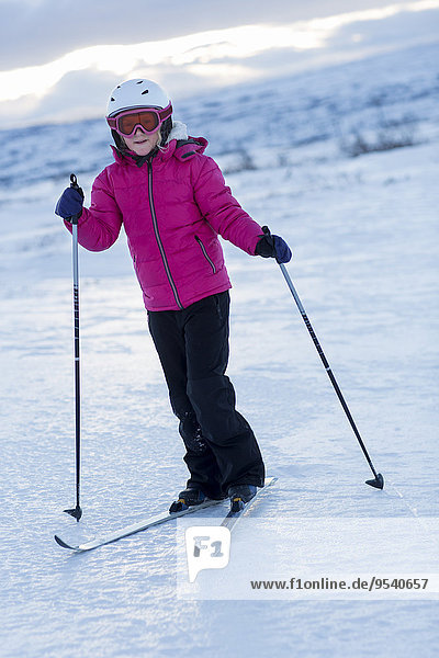 Frau fährt Ski