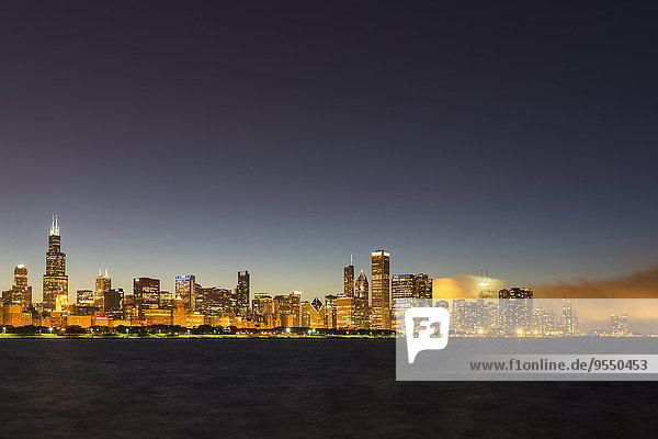 USA Illinois Chicago Skyline and Lake Michigan at night