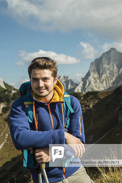 Austria  Tyrol  Tannheimer Tal  young man hiking
