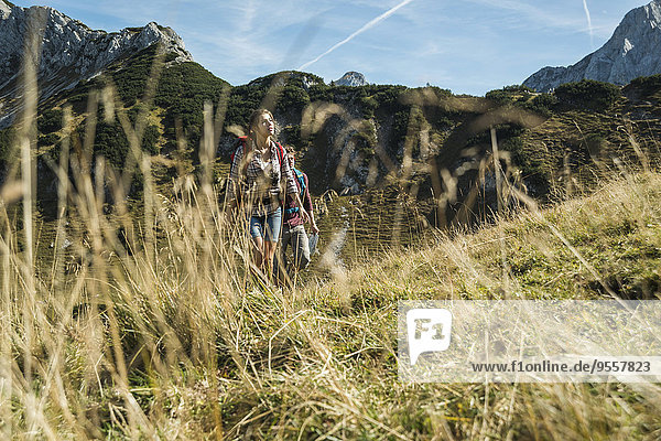Austria,  Tyrol,  Tannheimer Tal,  young couple hiking