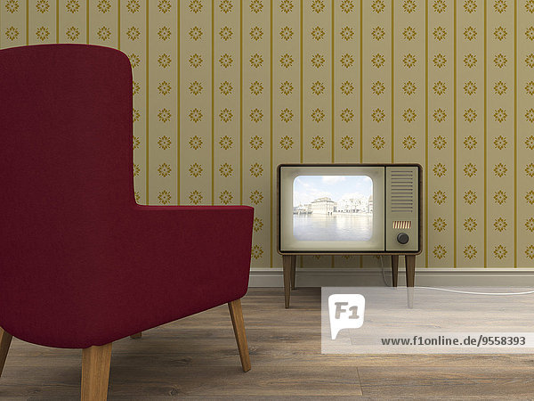 Alter Fernseher und roter Sessel im Retro-Stil im Wohnzimmer