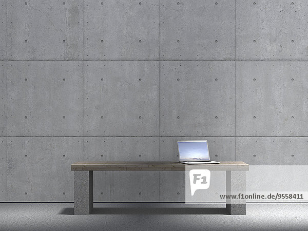 Laptop auf Bank vor Betonwand stehend  3D Rendering