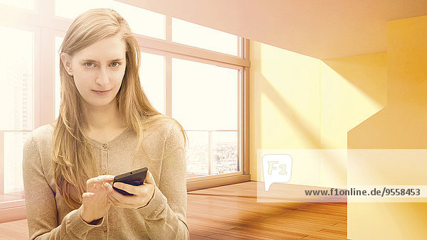 Junge Frau mit Handy in leerer Wohnung  Composite