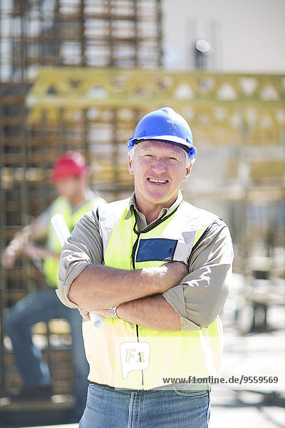 Portrait of smiling construction worker in construction site