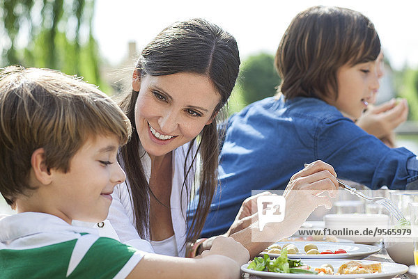 Family enjoying healthy meal outdoors