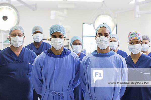 Team of surgeons in operating theater
