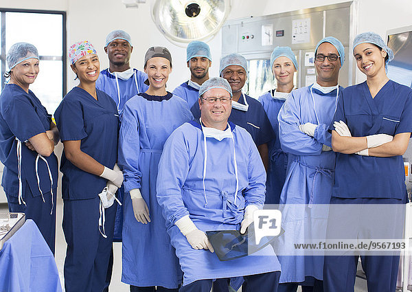 Team of doctors and nurses in operating theater