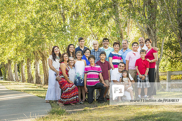 Extended family posing together outdoors