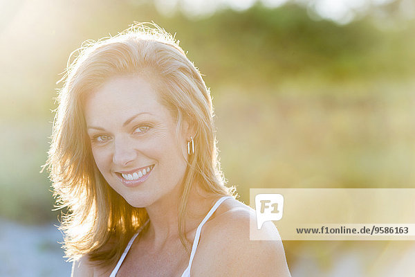 Caucasian woman smiling outdoors