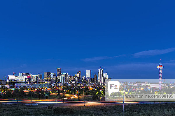 USA  Colorado  Denver  Cityscape and Interstate Highway in the evening