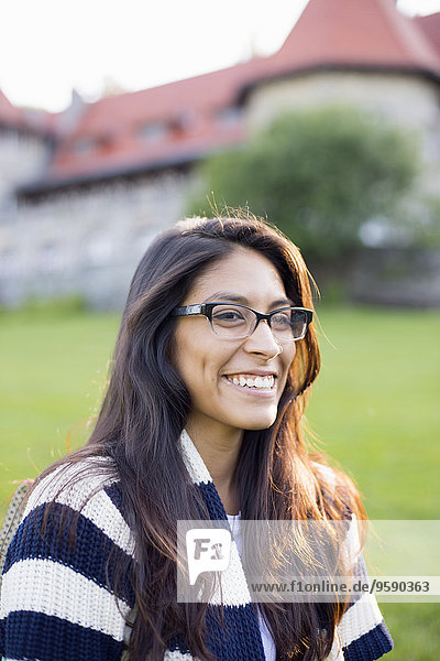 Student wearing glasses  smiling