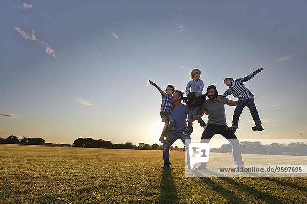 Family enjoying outdoor activities in the park