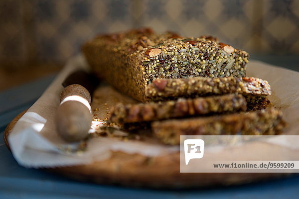 Gluten free seeded bread on kitchen table