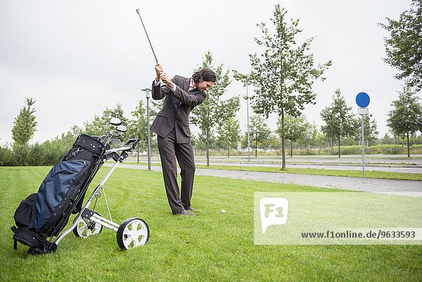 Businessman golf Practising Decision Determination