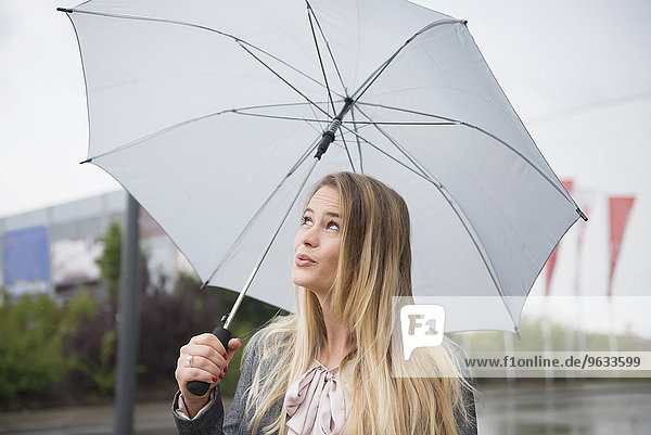 Businesswoman expectation anticipation weather
