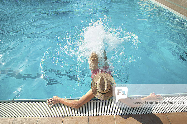 Swimming pool fun holiday water splashing teenager