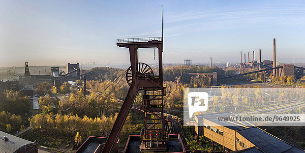 UNESCO World Heritage Site  Zeche Zollverein  view on headframe shaft 1  on the left double shaft 12  right the coking plant  Essen  North Rhine-Westphalia  Germany  Europe