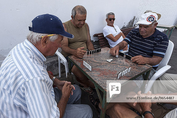 Men playing dominoes  Vueltas  Valle Gran Rey  La Gomera  Canary Islands  Spain  Europe