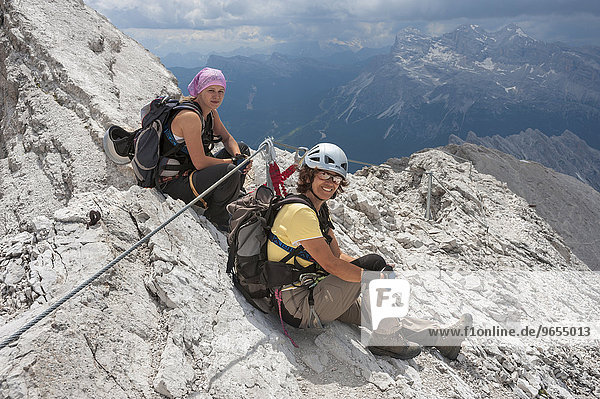 Female mountaineers at the Dibona Via Ferrata  Cristallo group  Ampezzo Dolomites  Cortina d'Ampezzo  Province of Belluno  Veneto  Italy  Europe