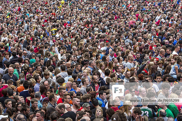 Densely packed crowd at a public festival  Mons  Wallonia  Belgium  Europe