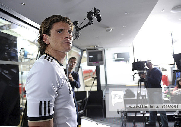 Mario GOMEZ on the set  German national football team shooting a promotional ad for the DFB German Football League general sponsor Mercedes-Benz for the 2010 World Cup in South Africa in the Mercedes-Benz Arena stadium  Stuttgart  Baden-Wuerttemberg  Germany  Europe