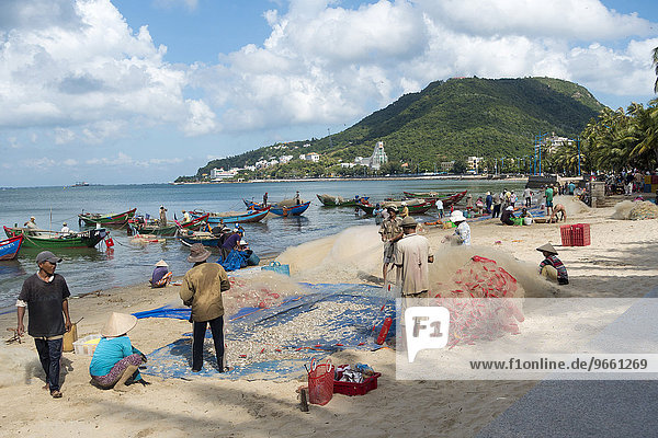 Fishermen on the beach  Vung Tau  Vietnam  Asia