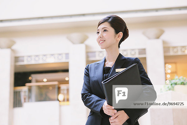 Japanese female hotel concierge