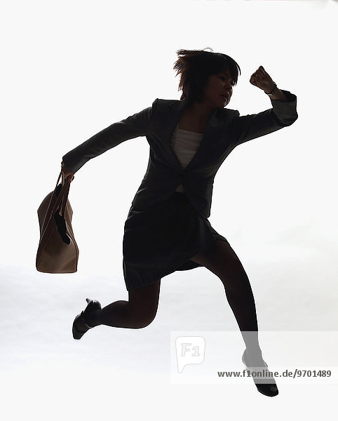Japanese businesswoman sprinting