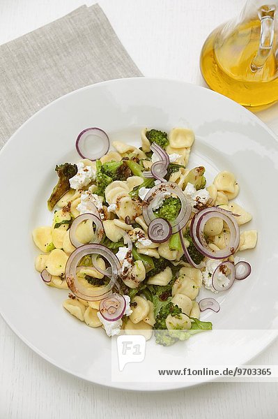 Orecchiette pasta with broccoli and red onions