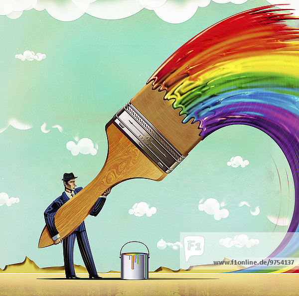 Geschäftsmann mit großem Pinsel malt bunten Regenbogen