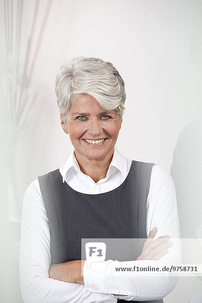 Porträt einer lächelnden reifen Geschäftsfrau